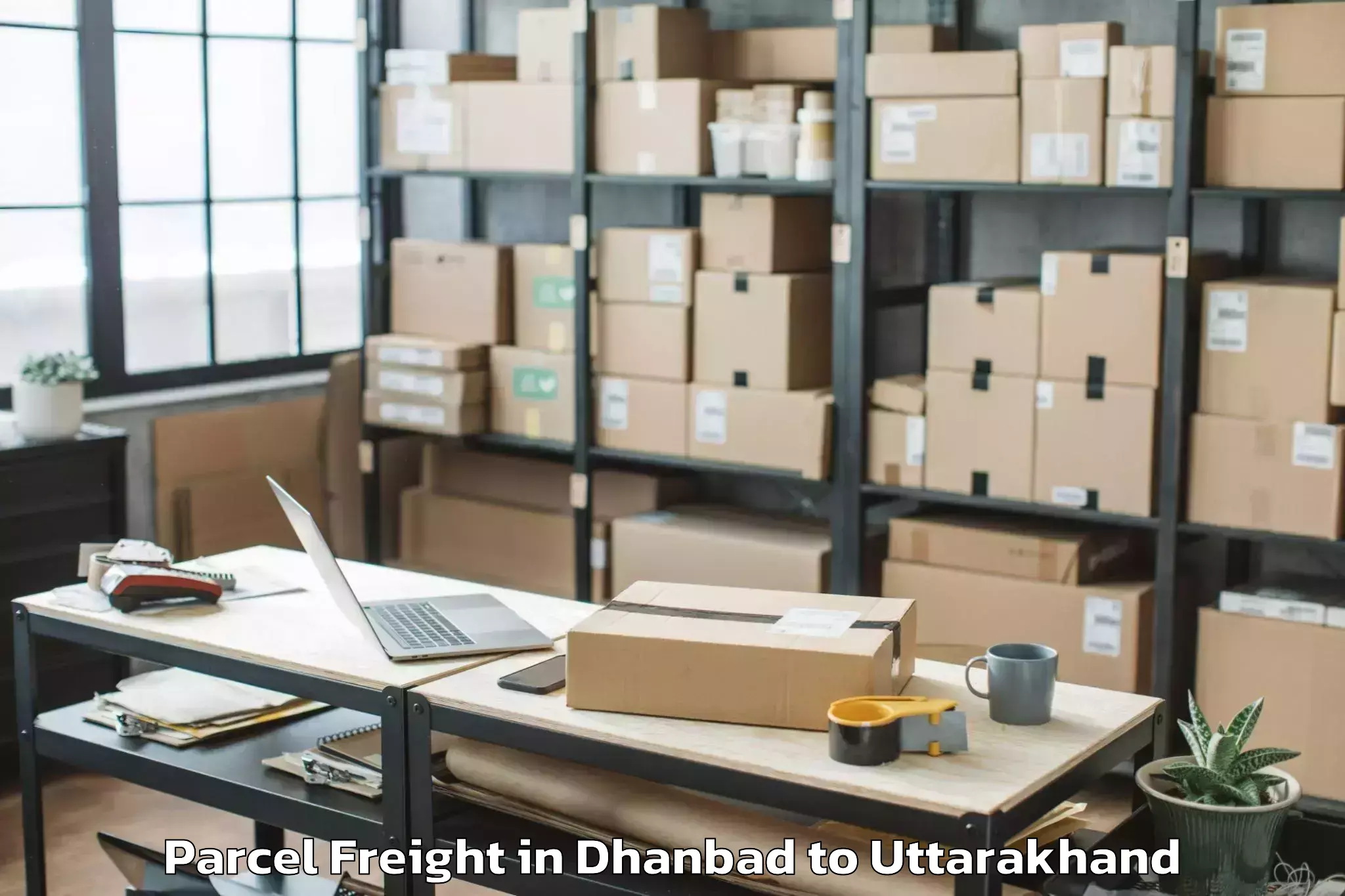 Book Dhanbad to Khalsi Parcel Freight